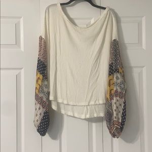 Waffle knit top with statement sleeves